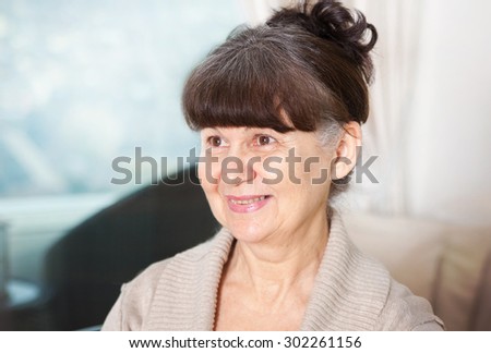 Pension age good looking woman portrait