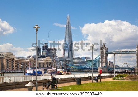 LONDON, UK - APRIL 30, 2015:  Shard of glass and Tower bridge view