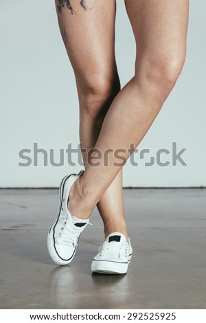 Female Legs Crossed - Sneakers