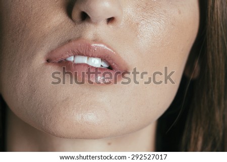 Female Face - Shallow Depth of Field - Biting Lip