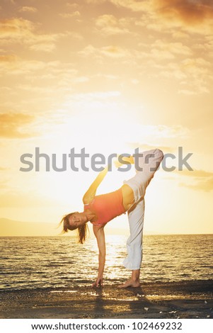 Beautiful Yoga Woman at Sunset