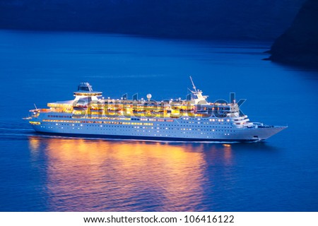 Luxury Cruise Ship Sailing at Sunset Luxury Cruise Ship Sailing at Sunset
