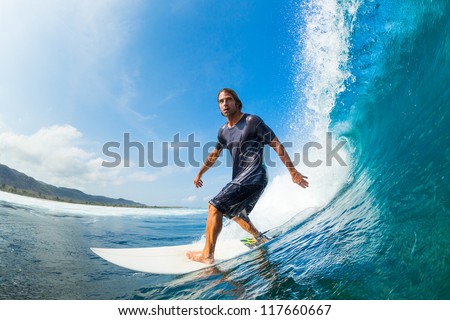Surfer Riding Large Blue Ocean Wave Surfer Riding Large Blue Ocean Wave