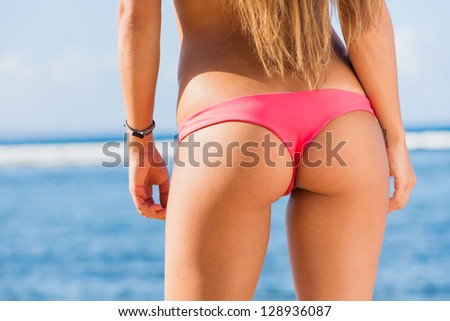 perfect young woman in sexy bikini at the beach