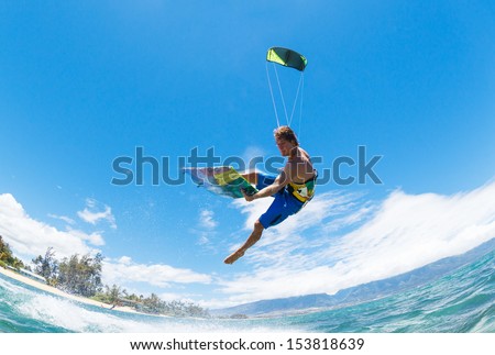 Young Man KiteBoarding, Fun in the ocean, Extreme Sport Kitesurfing