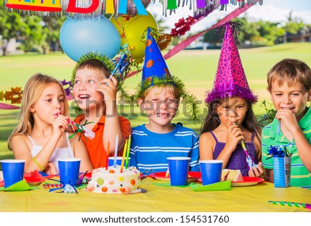 Kids at Birthday Party, Cake and Balloons