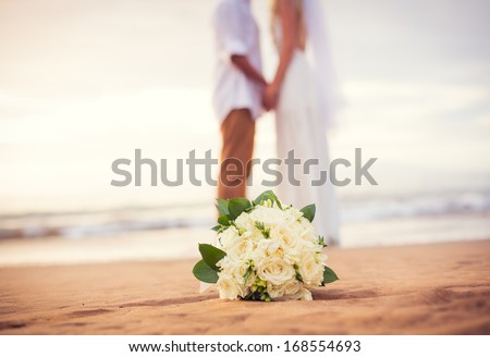 Just married couple holding hands on the beach, Hawaii Beach Wedding