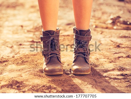 Stylish Boots, Close up view of woman wearing stylish boots on dusty road