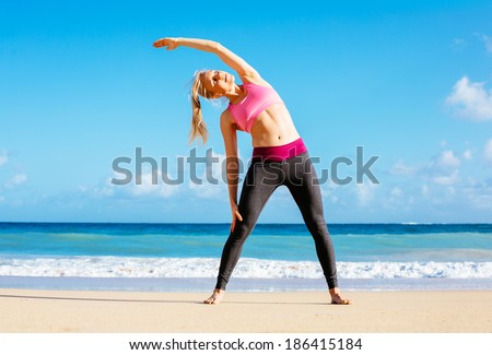 Athletic Young Fitness Woman Stretching At the Beach, Yoga workout exercise