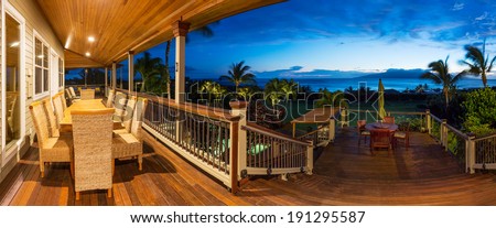 Beautiful Home Exterior Patio Deck and Dining Table with Sunset View Beautiful Home Exterior Patio Deck and Dining Table with Sunset View