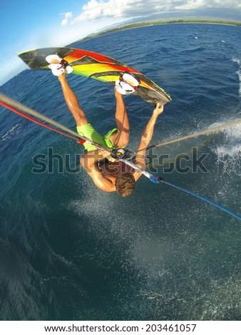 Kiteboarding, Fun in the Ocean, Extreme Sport. Action Camera POV angle with motion blur.