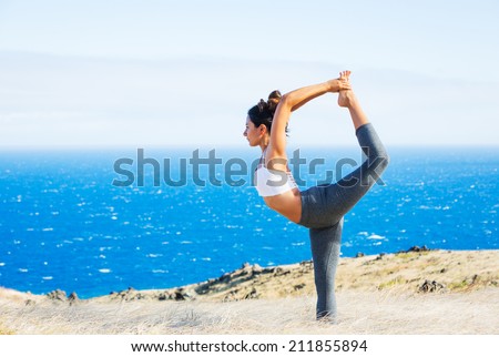 Yoga woman outdoors in nature