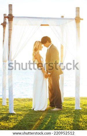 Wedding. Romantic Bride and Groom in Love on Wedding Day.