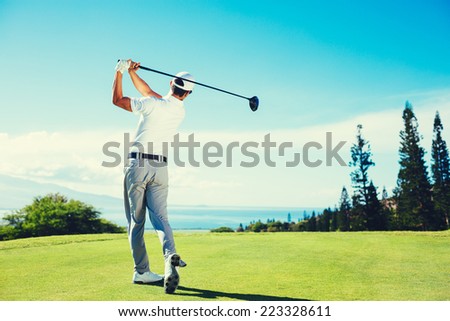 Golfer Playing on Beautiful Golf Course
