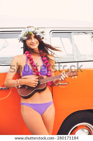 Beach Lifestyle, Beautiful Surfer Girl with Ukulele and Classic Vintage Surf Van on the Beach at Sunset