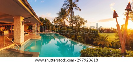 Beautiful Luxury Home with Swimming Pool at Sunset