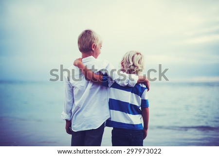Brothers, Happy young brothers hugging at sunset. Friendship brotherhood concept