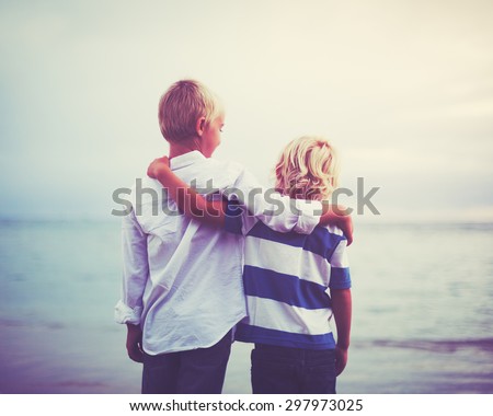 Brothers, Happy young brothers hugging at sunset. Friendship brotherhood concept