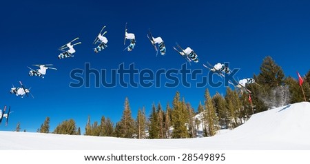 Sequence of a Skier doing a Radical Back flip on a Sunny Day at a Ski resort