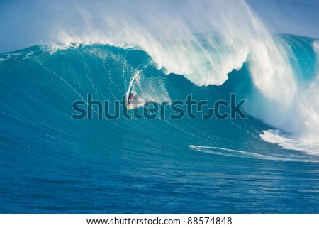 MAUI, HI - MARCH 13: Professional surfer Francisco Porcella rides a giant wave at the legendary big wave surf break \