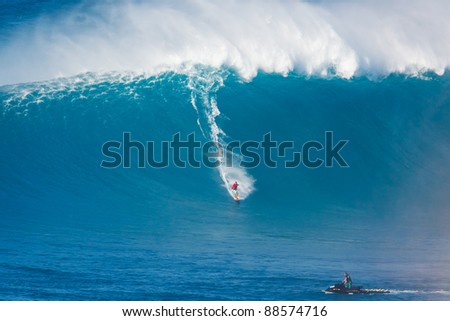 MAUI, HI - MARCH 13: Professional surfer Kiva Rivers catches a giant wave at the legendary big wave surf break known as \