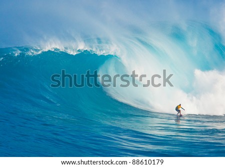 MAUI, HI - MARCH 13: Professional surfer Yuri Soledade rides a giant wave at the legendary big wave surf break known as \