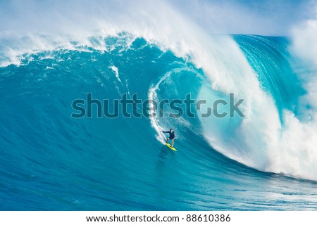 Maui, Hi - March 13: Professional Surfer Carlos Burle Rides A Giant Wave At The Legendary Big Wave Surf Break &Quot;Jaws&Quot; During One The Largest Swells Of The Winter March 13, 2011 In Maui, Hi.