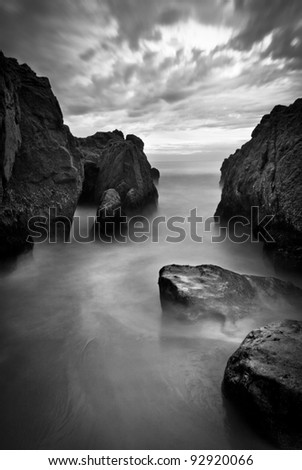 Beautiful Seascape, Ocean and Rocks at Sunset, Black and White Image