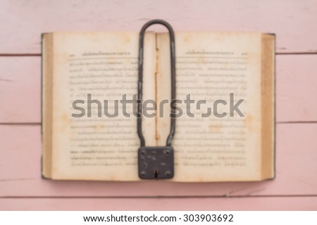 Blurred old book with master key background is bokeh for your edit.