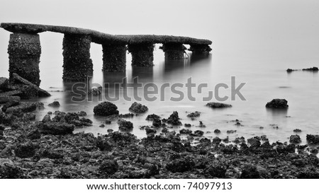 broken stone bridge with long exposure in black & white