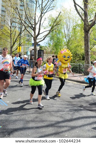 LONDON - APRIL 22: Fun Runners Attending The Annual London Marathon London April 22nd, 2012 in London, England.