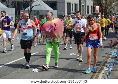 LONDON - APRIL 21:Fun Runners take part in the 2013 London Marathon to raise money for charity on the streets of London April 21st, 2013 in London, England.