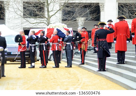 LONDON - APRIL 17:The Coffin of ex British Prime Minster Margret Thatcher departs her funeral outside St Pauls Cathedral London April 17th, 2013 in London, England.