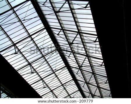 This is a close up view of the interior roof in Waterloo Train Station.