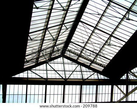This is a close up view of the interior roof in Waterloo Train Station.