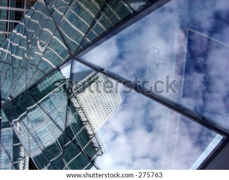 This is a close up off a window in London\'s docklands, if you look in the reflection you can see Canary wharf.