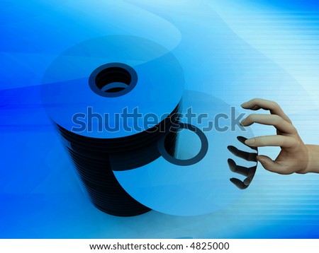 An image of what could be some DVD\'s or CD\'s. With a hand taking one from the pile.