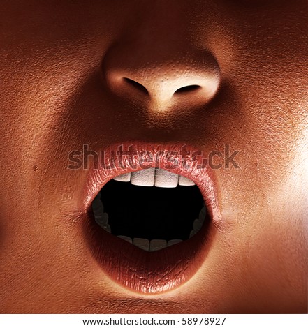 Female mouth shouting.