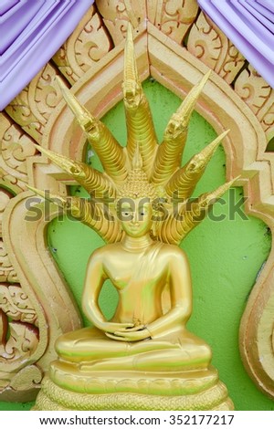 sitting buddha image with seven naka