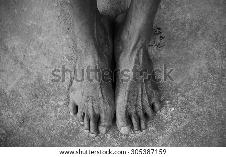 The feet of a old man.Black and White.