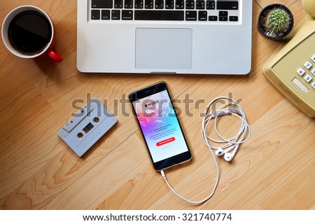 CHIANG MAI,THAILAND - SPE 29,2015  Apple music app showing on iPhone 6 plus in his office. Apple Music is the new iTunes-based music streaming service that arrived on iPhone