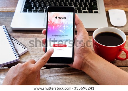 CHIANG MAI,THAILAND - NOV 05 ,2015  Apple music app showing on iPhone 6 plus in his office. Apple Music is the new iTunes-based music streaming service that arrived on iPhone