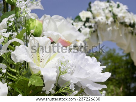 close-up wedding place decoration with artificial flowers
