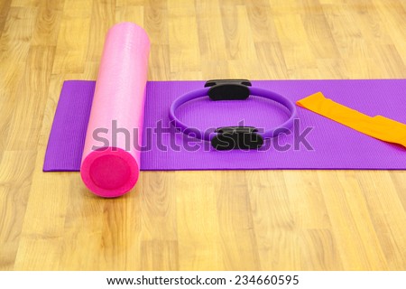 Aerobic pilates stuff: magic ring ,roller, yoga mat.