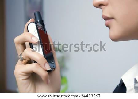 The girl speaks on a portable radio set