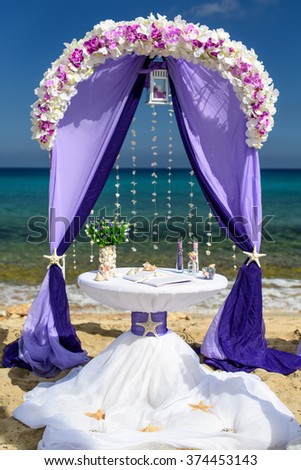 set of accessories for a wedding on the shores of the Caribbean Sea. Arch decorated with flowers