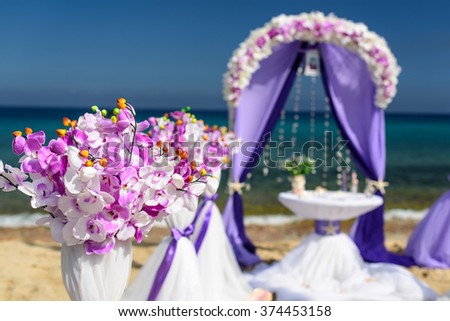 set of accessories for a wedding on the shores of the Caribbean Sea. Arch decorated with flowers