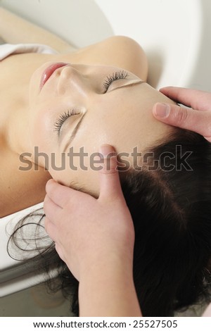 Beautiful girl having massage in spa , Enjoy nice time..