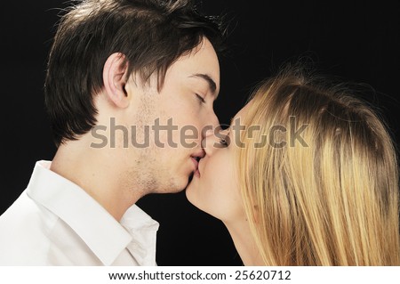 Young couple in love kissing each other