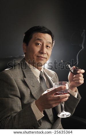 A Asia businessman Confidence smiling and smoking